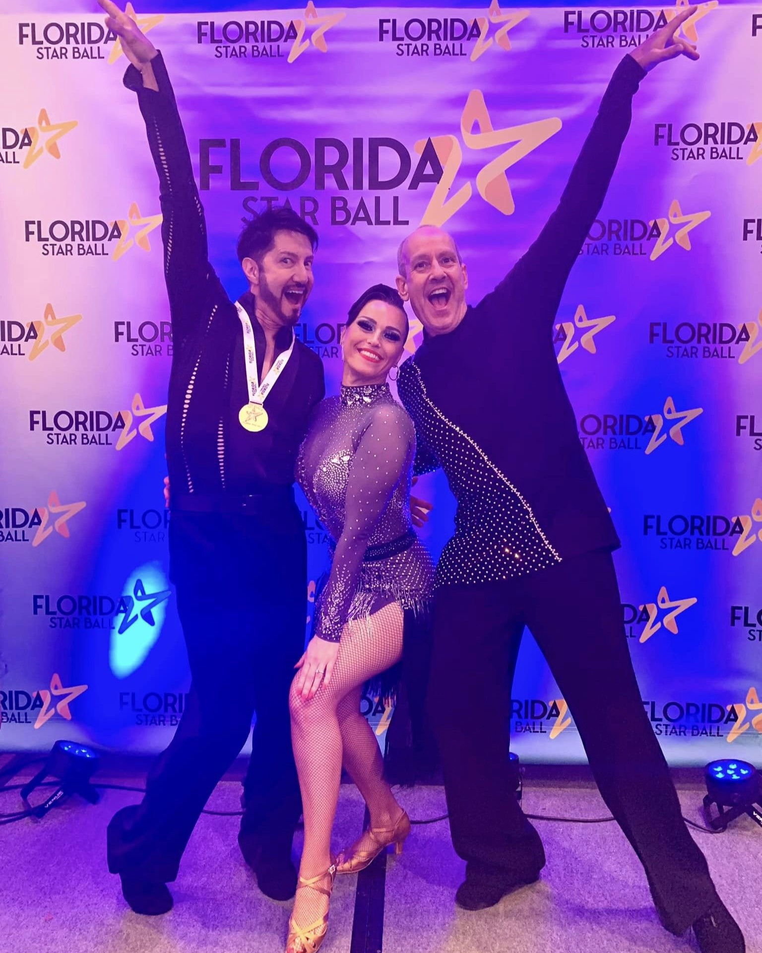 3 smiling dancers