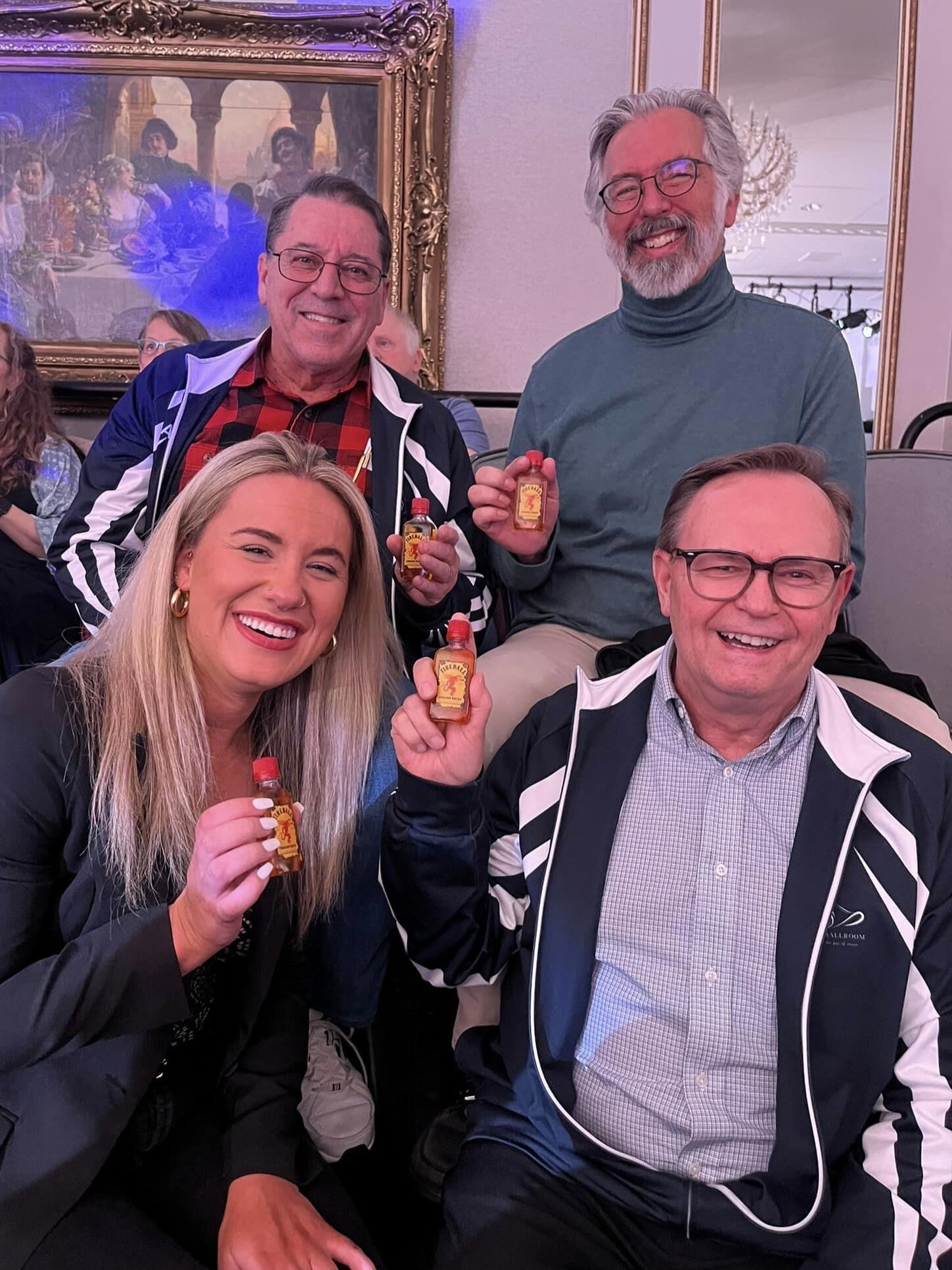 4 guests with traditional drink shots