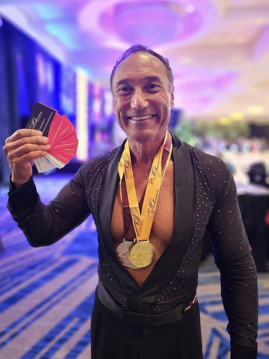 Male performer with medals