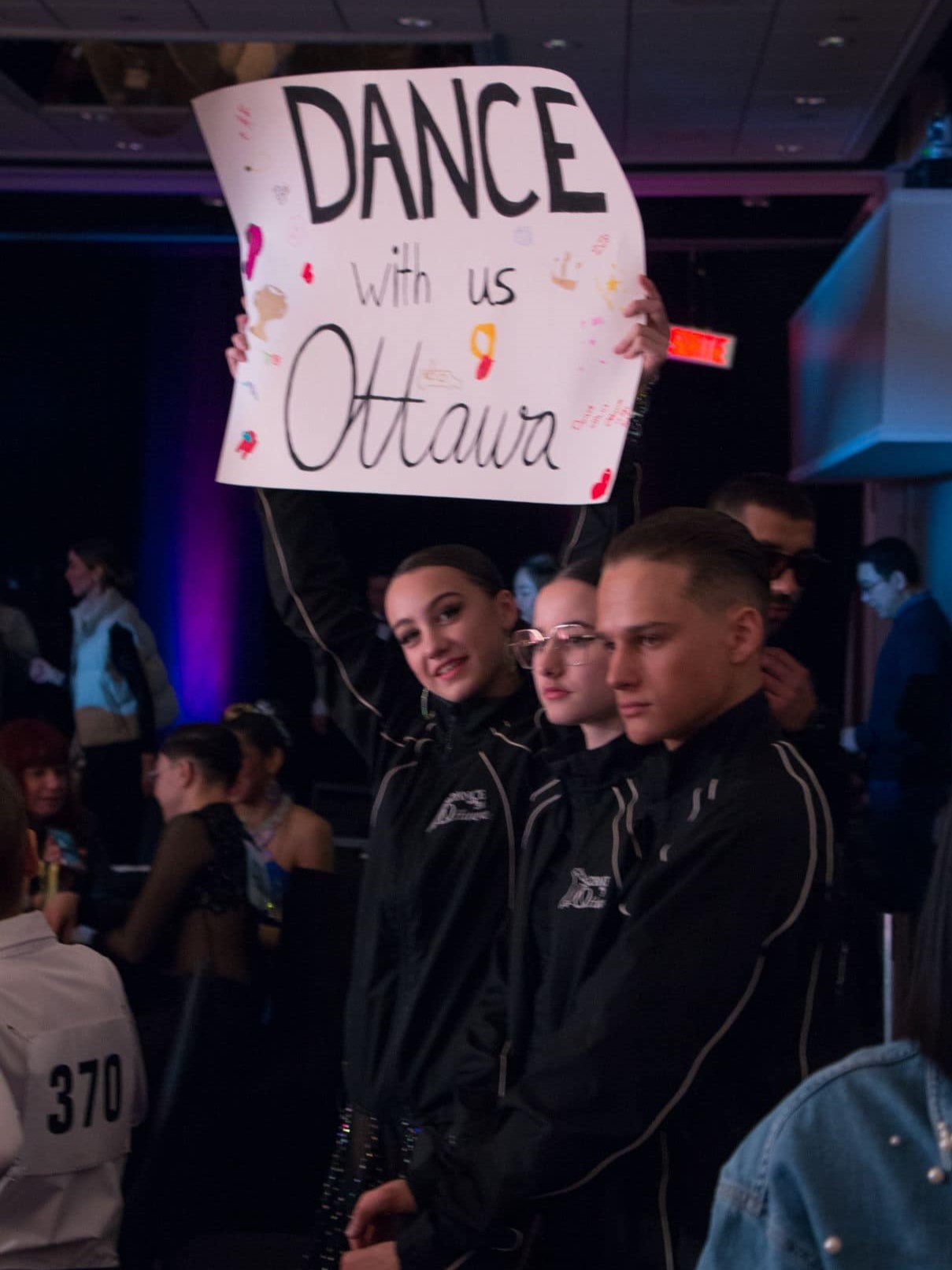 Dancer holding banner