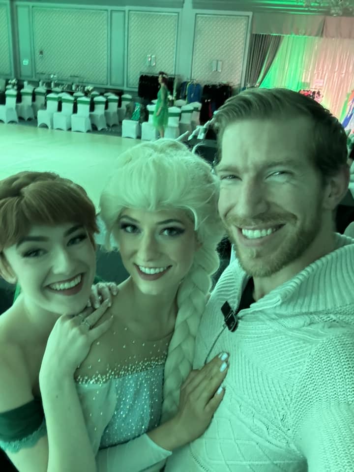 3 performers in disney costume