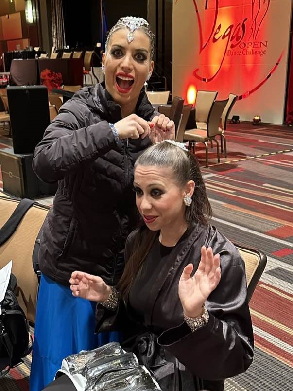 2 performers prepping
