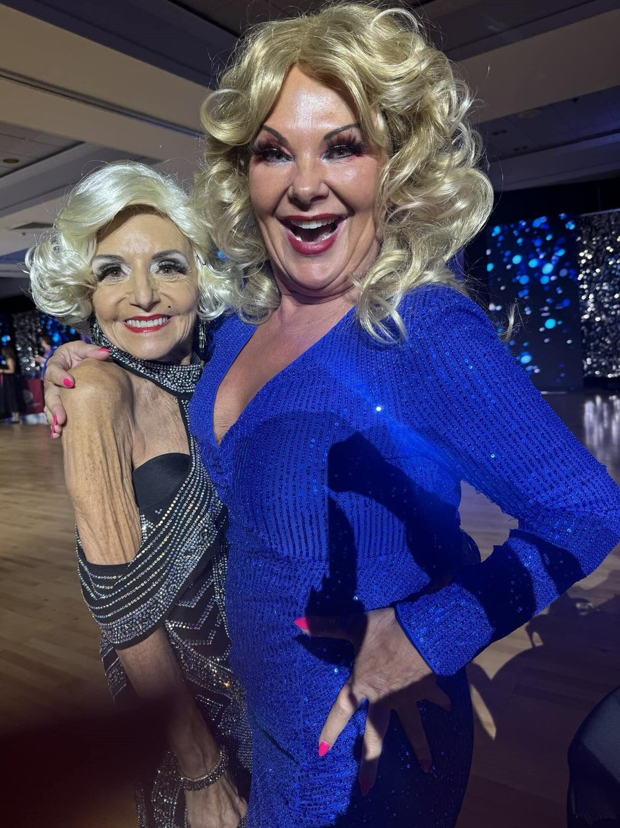 2 ladies in their funky outfit