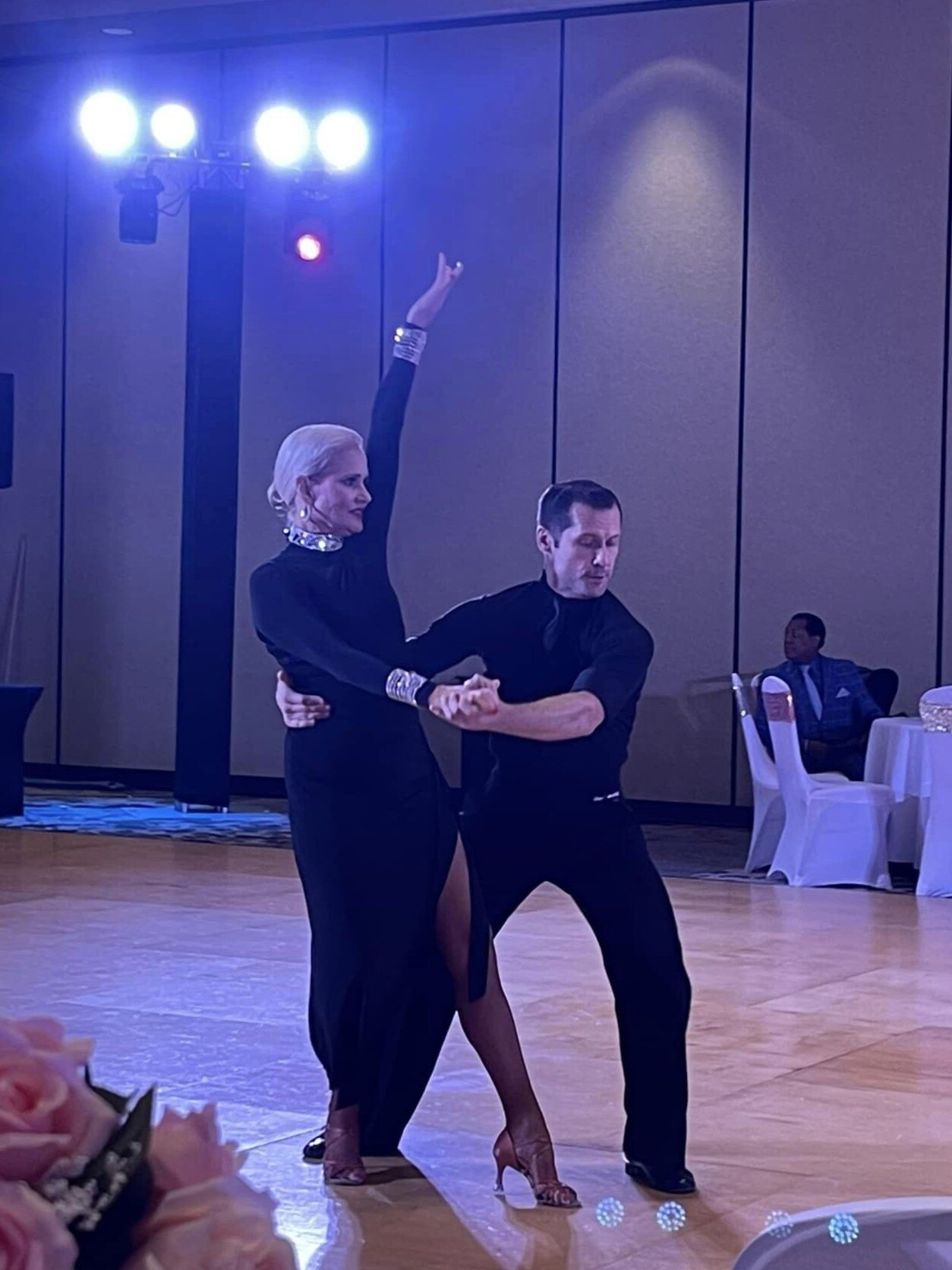 A pair dancing on dancefloor
