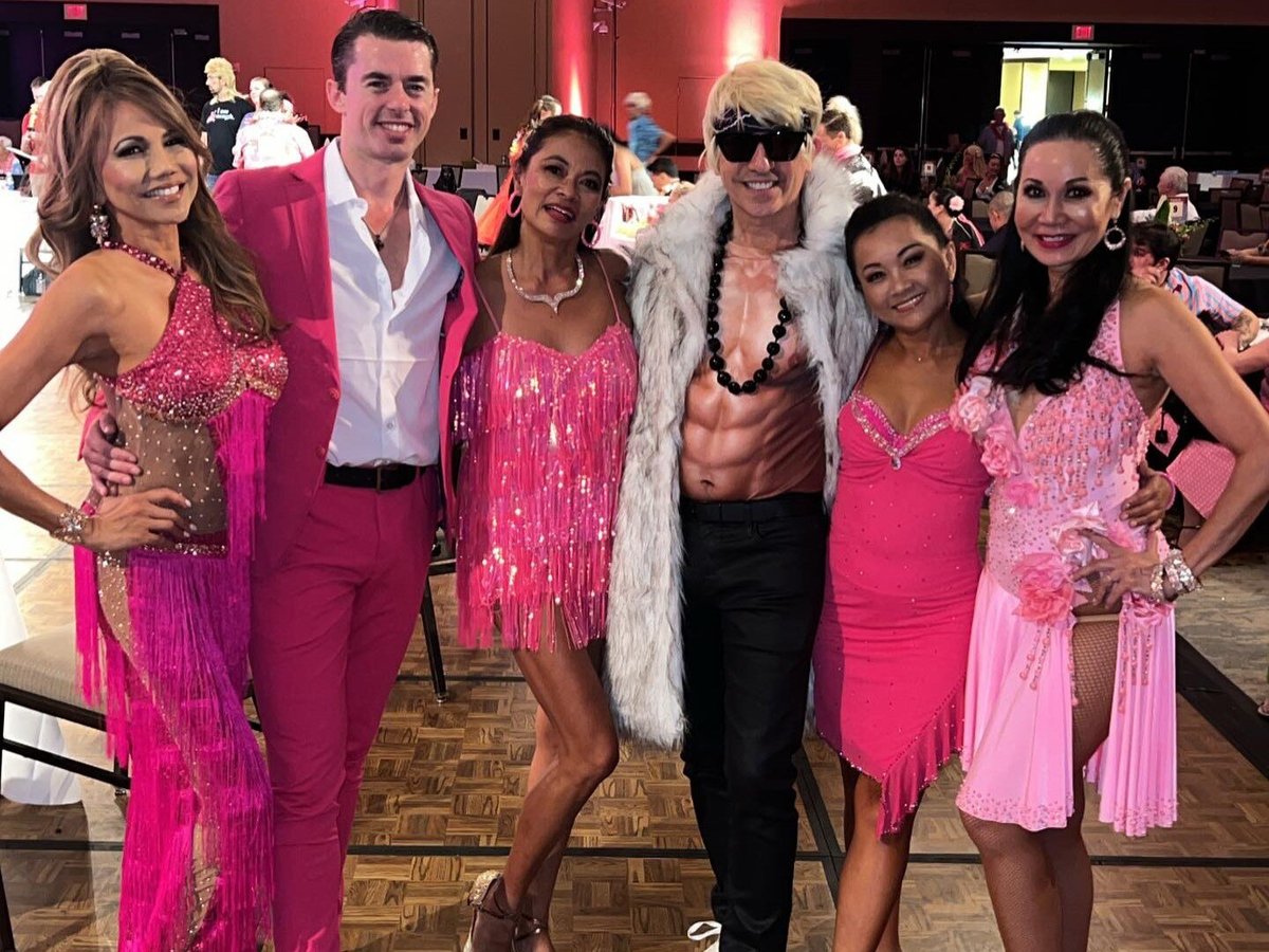 participants in their Barbie-themed outfit