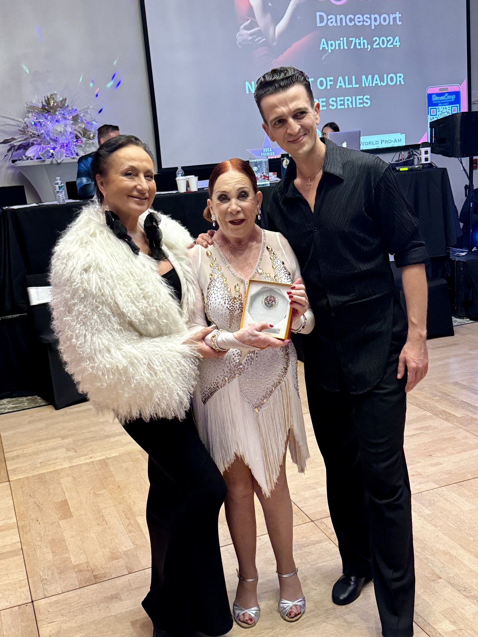2 dancers with the organizers